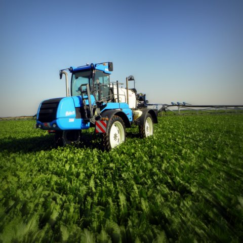 Sprayer in field - foliar feeding 